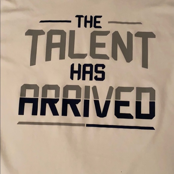 A white athletic shirt - Picture 2 of 3